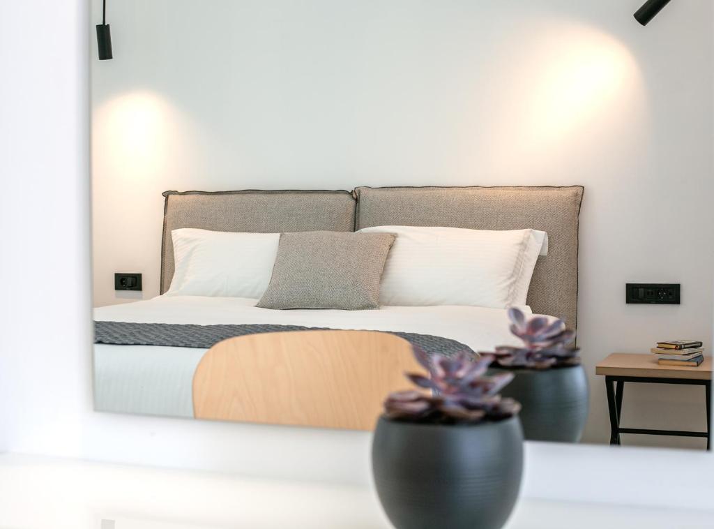 Łóżko lub łóżka w pokoju w obiekcie Kallos Imar Boutique Hotel