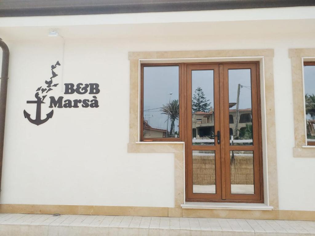 Certifikát, hodnocení, plakát nebo jiný dokument vystavený v ubytování B&B Marsà