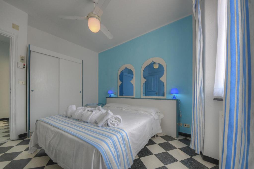 Posteľ alebo postele v izbe v ubytovaní Hotel Arabesque