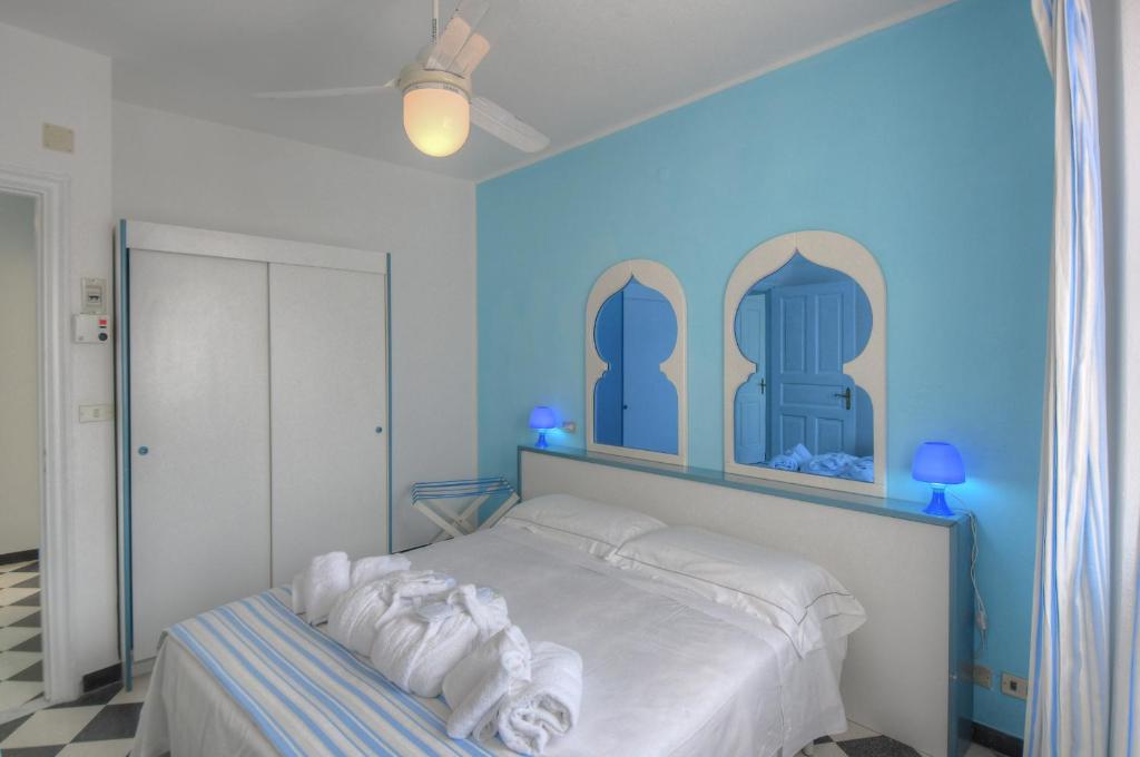 Posteľ alebo postele v izbe v ubytovaní Hotel Arabesque