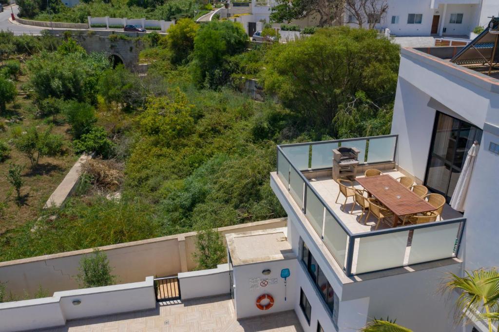 an aerial view of the balcony of a house at Baldacchino Holiday Villas in Mellieħa