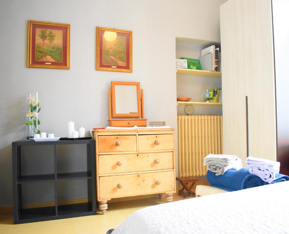 Postel nebo postele na pokoji v ubytování Villa Scalabrini