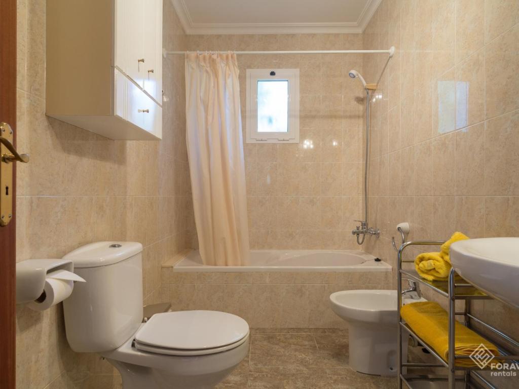 Koupelna v ubytování Villa garballo