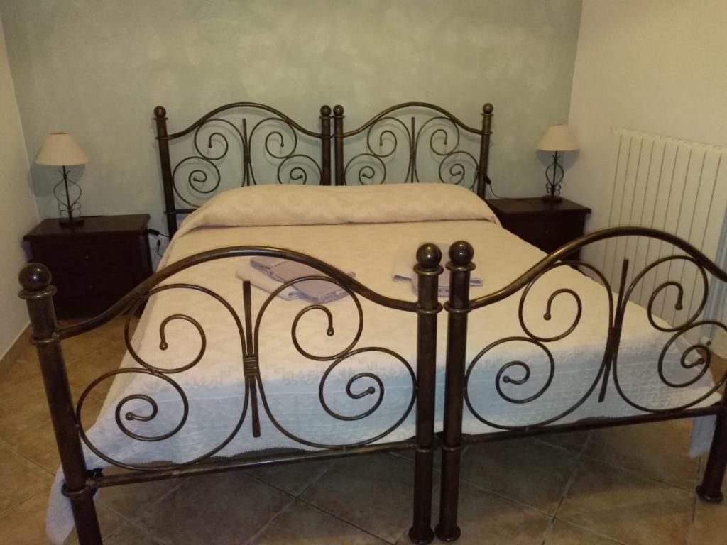 Postel nebo postele na pokoji v ubytování Agriturismo Iloghe