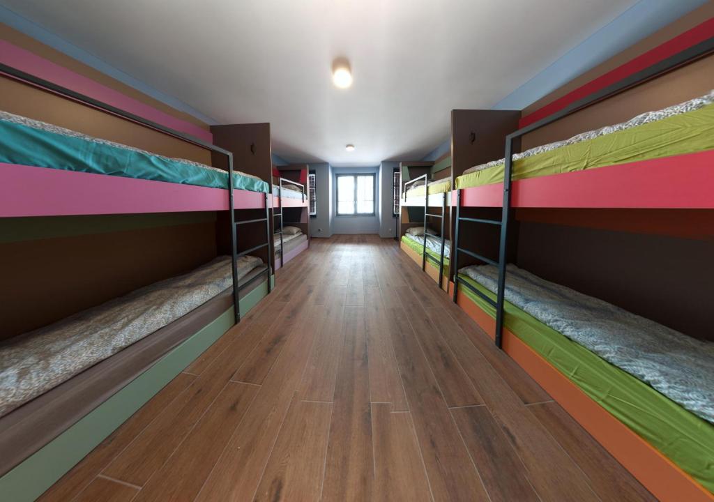 Postel nebo postele na pokoji v ubytování Ura Hostel