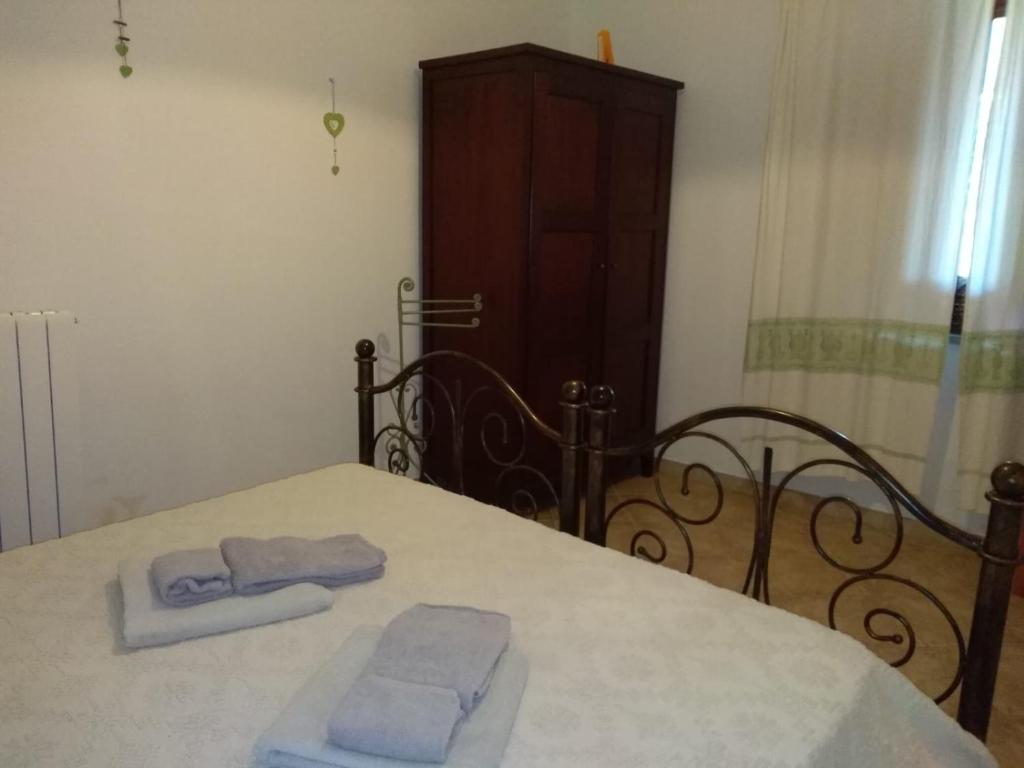Postel nebo postele na pokoji v ubytování Agriturismo Iloghe