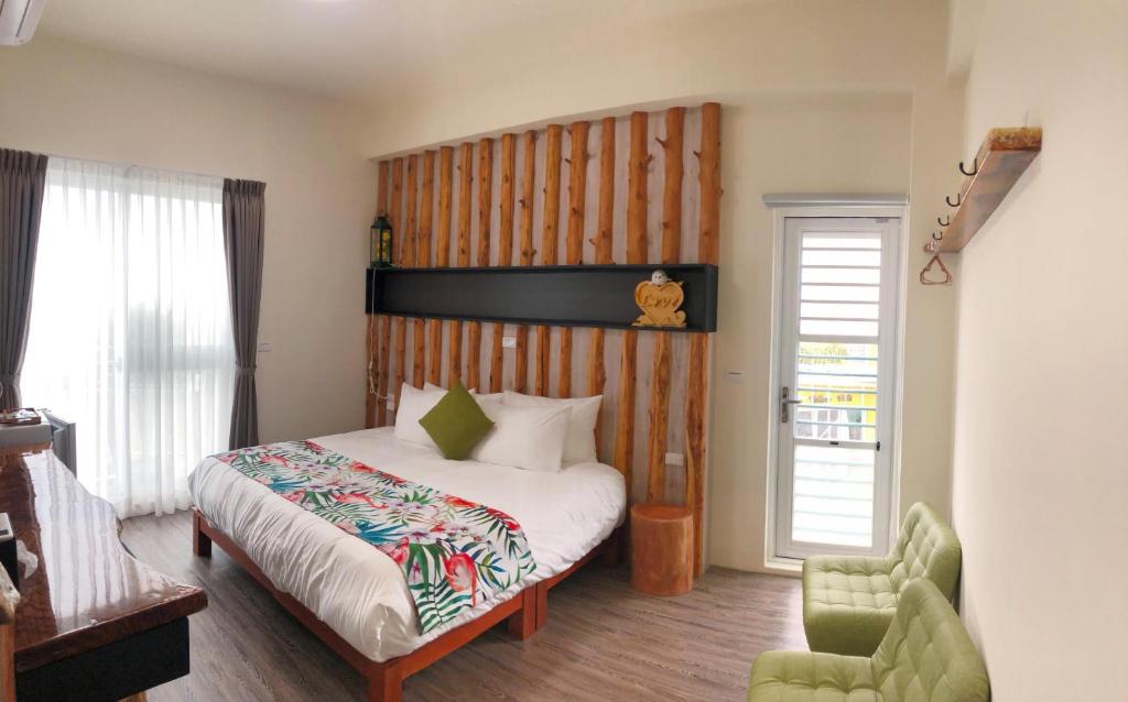 Postel nebo postele na pokoji v ubytování Inn巷文創旅店 Inn siang B&B-墾丁夢幻島