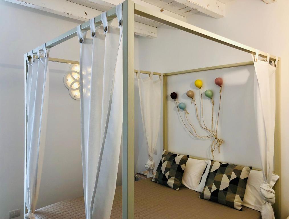 Postel nebo postele na pokoji v ubytování Atipico B&B
