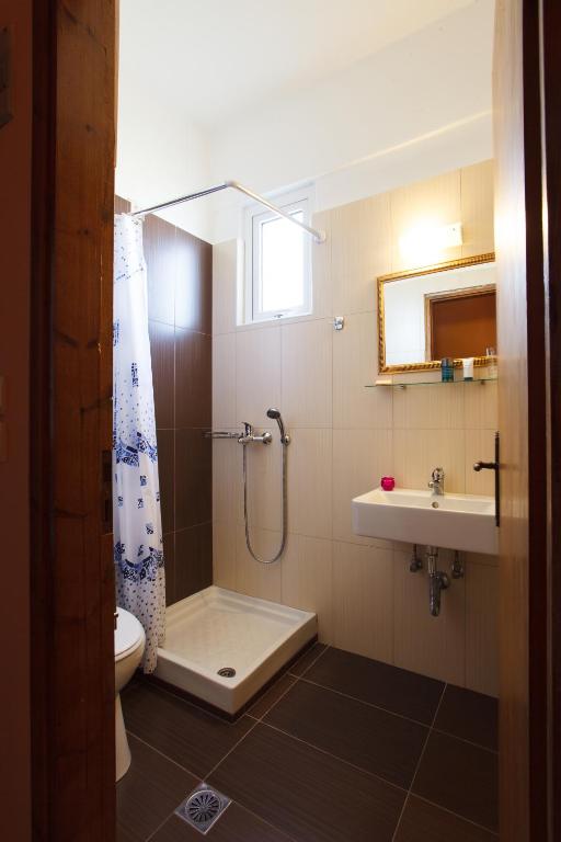 Koupelna v ubytování Babis Hotel