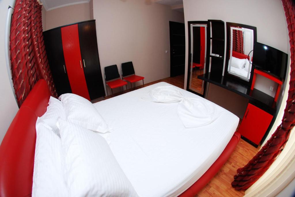 Postel nebo postele na pokoji v ubytování Hotel Ramo Saranda