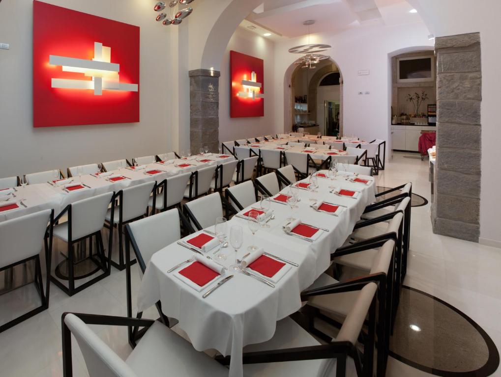 Reštaurácia alebo iné gastronomické zariadenie v ubytovaní Hotel Coppe Trieste - Boutique Hotel