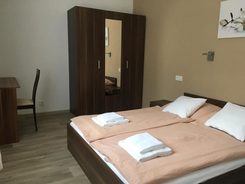 Postel nebo postele na pokoji v ubytování Pension Palla