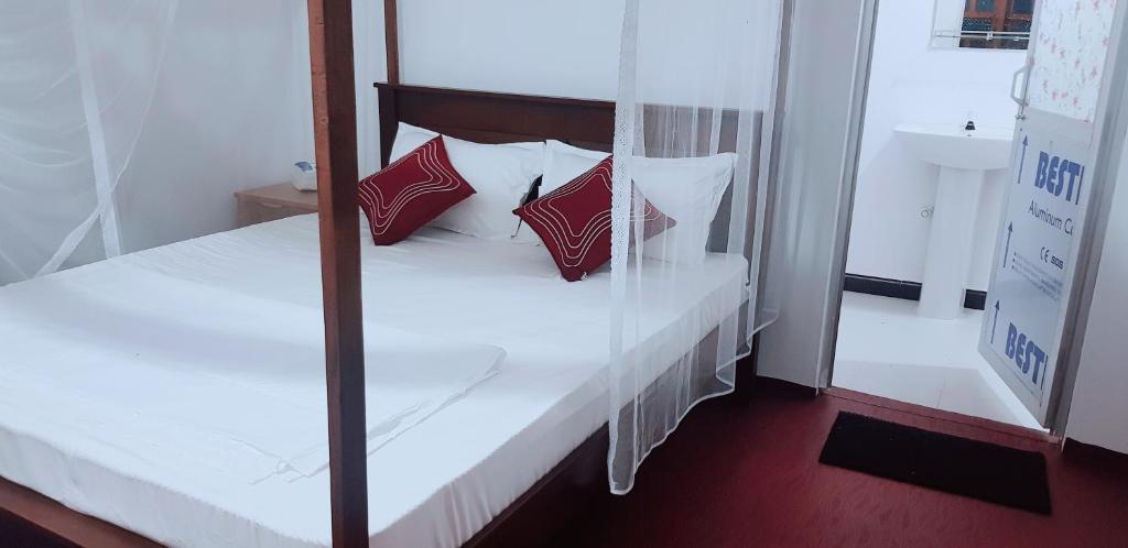Postel nebo postele na pokoji v ubytování Exotic Beach Hotel