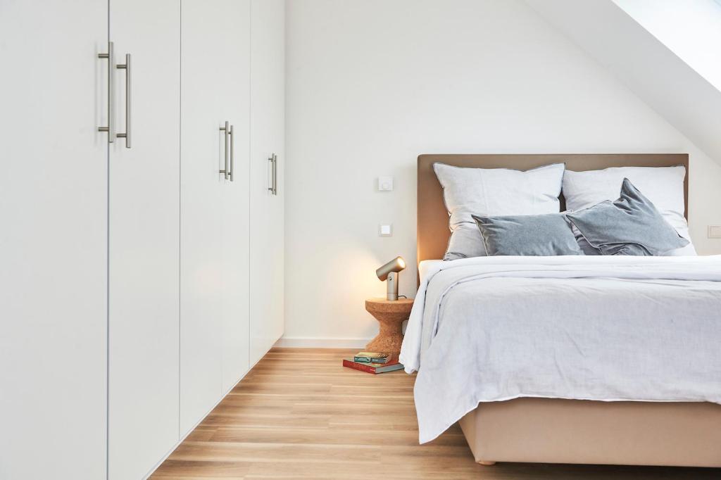 Postel nebo postele na pokoji v ubytování Boardinghome Oldenburg