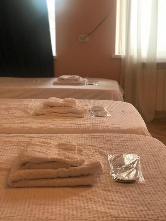 Postel nebo postele na pokoji v ubytování Guest House Story