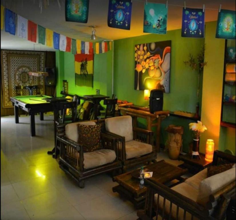 Posezení v ubytování Casa Kiwi Hostel