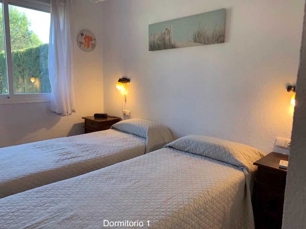 Posteľ alebo postele v izbe v ubytovaní Novo Sancti Petri - Adosado Residencial El Trebol - Chiclana