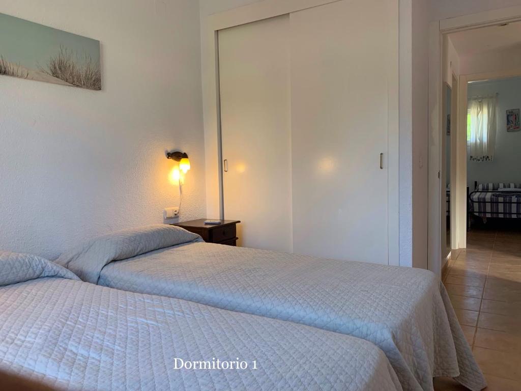 Posteľ alebo postele v izbe v ubytovaní Novo Sancti Petri - Adosado Residencial El Trebol - Chiclana