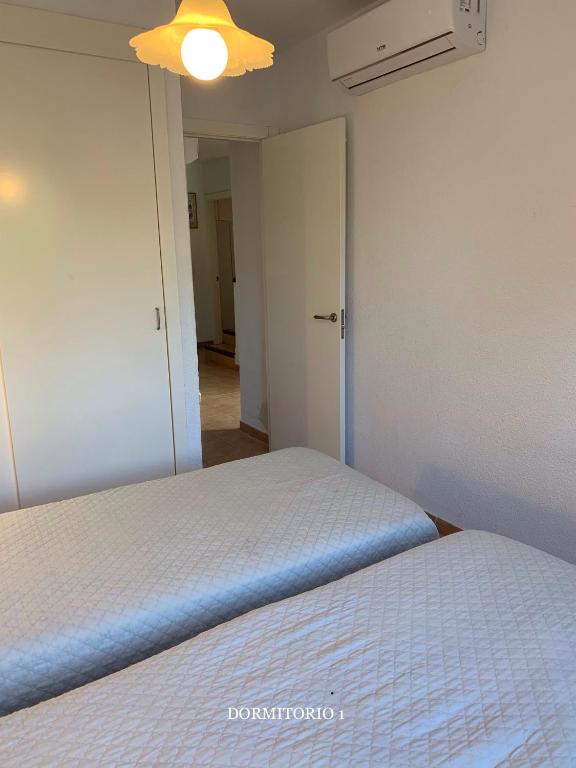Posteľ alebo postele v izbe v ubytovaní Novo Sancti Petri - Adosado Residencial El Trebol - Chiclana