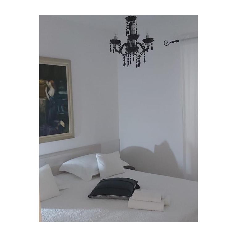Postel nebo postele na pokoji v ubytování Oleander Apartment & Room Centar
