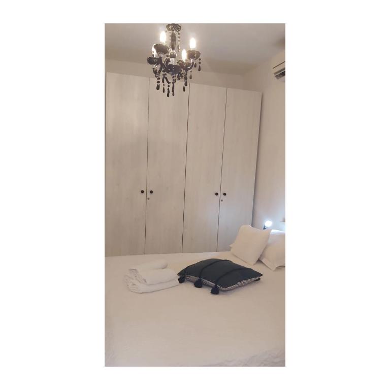 Postel nebo postele na pokoji v ubytování Oleander Apartment & Room Centar
