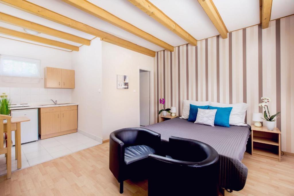 Kuchyňa alebo kuchynka v ubytovaní Apartman Szanyi