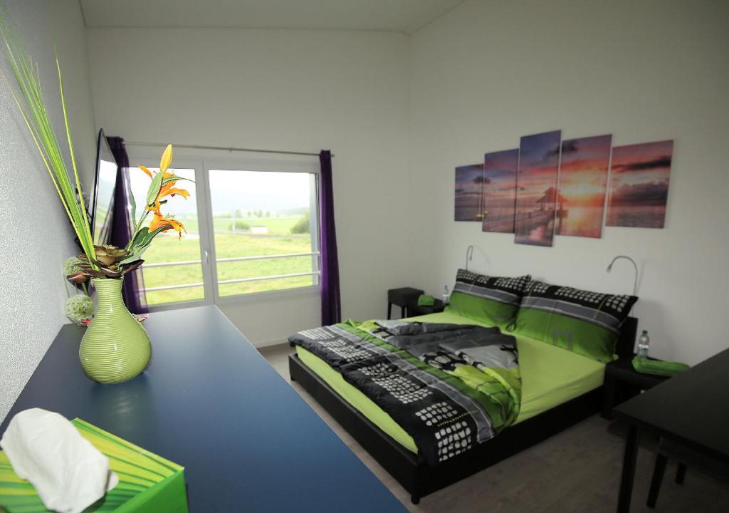 Postel nebo postele na pokoji v ubytování BeachIN - Sport, Events, Hotel, Restaurant, Bar
