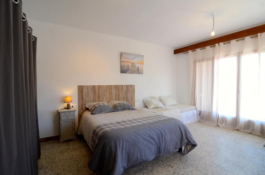 Posteľ alebo postele v izbe v ubytovaní VILLA MONTGO