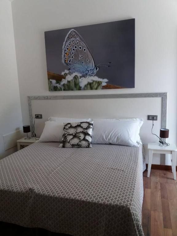 Postel nebo postele na pokoji v ubytování LOCANDA RIGHETTO