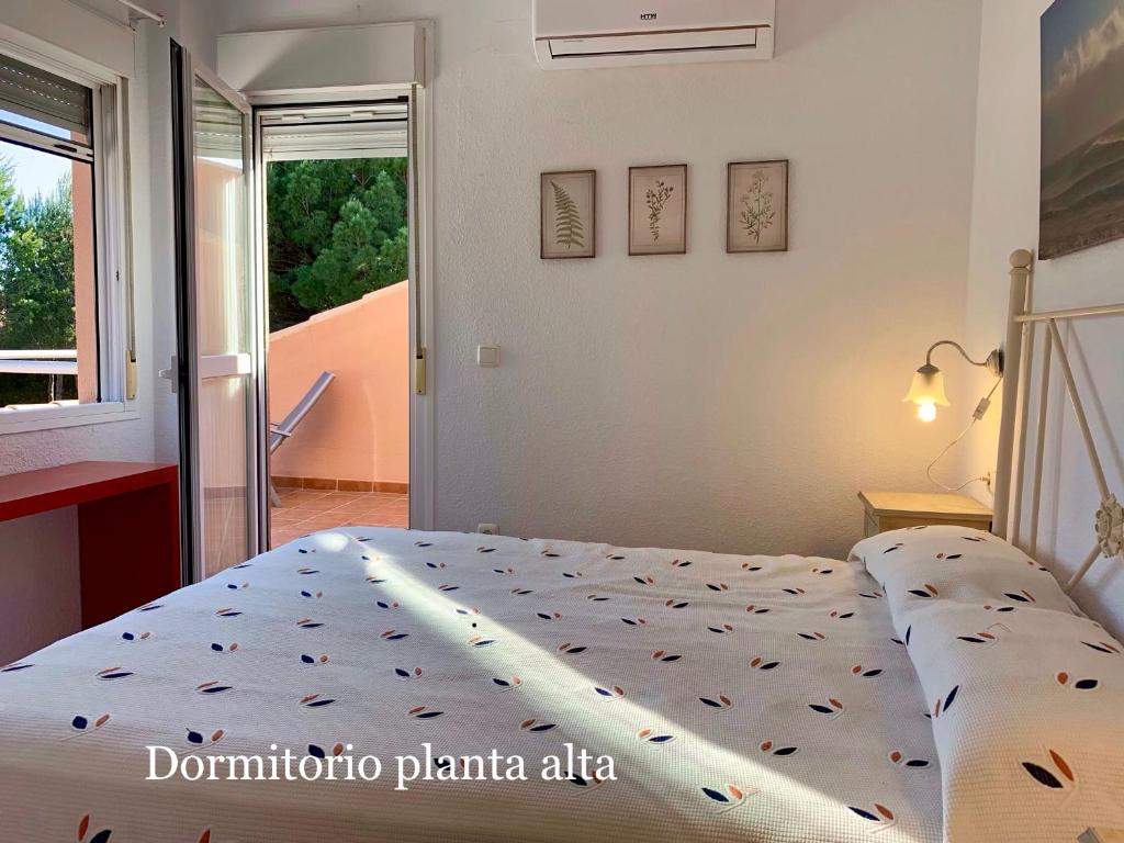 Posteľ alebo postele v izbe v ubytovaní Novo Sancti Petri - Adosado Residencial El Trebol - Chiclana