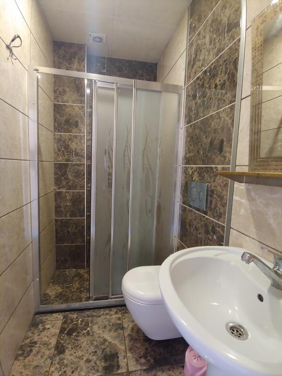 Koupelna v ubytování Hotel Yonca