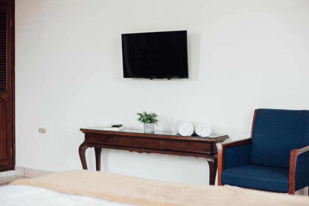 TV a/nebo společenská místnost v ubytování Valley Garden Hotel