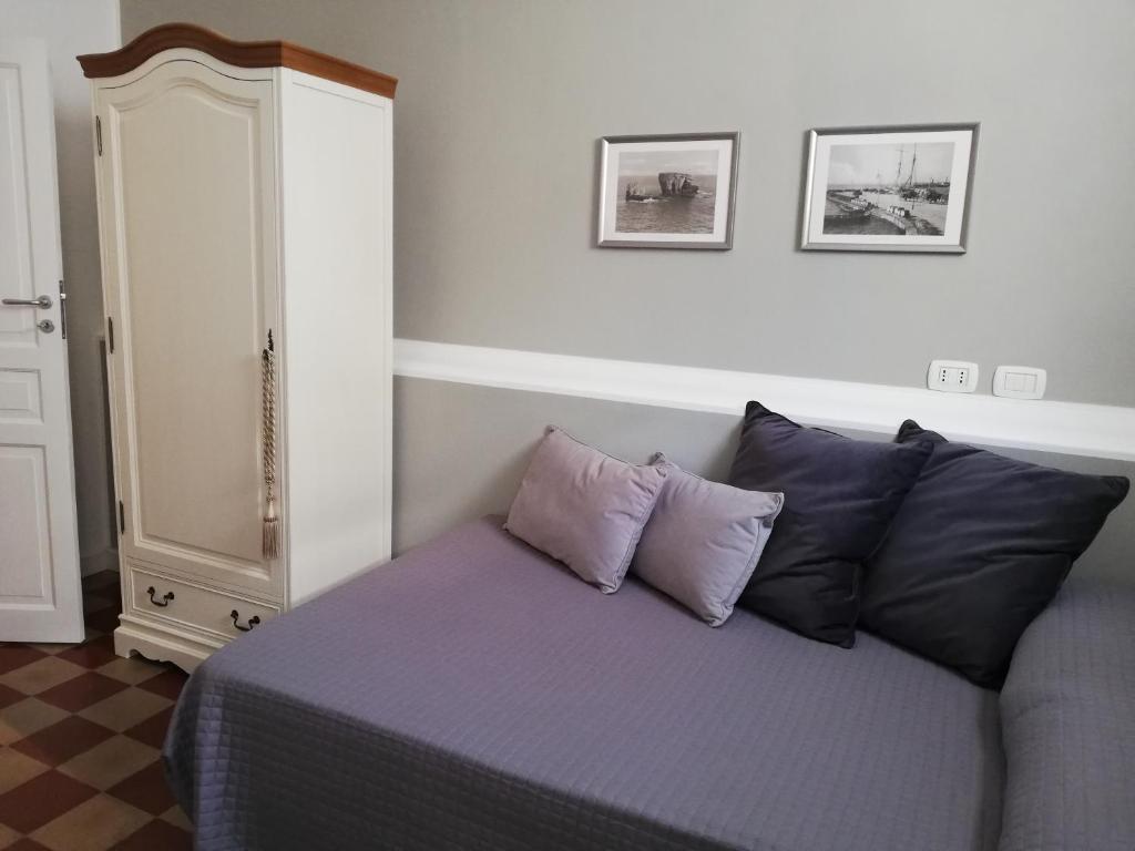 Postel nebo postele na pokoji v ubytování Residenza Ponente
