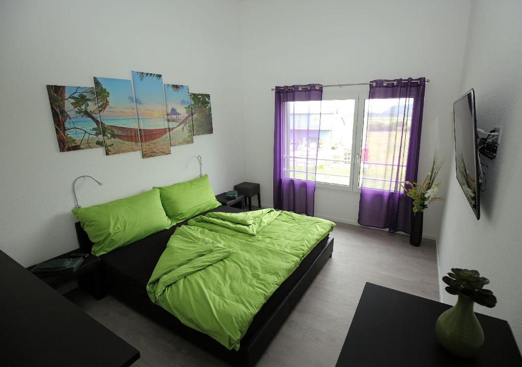 Ein Bett oder Betten in einem Zimmer der Unterkunft BeachIN - Sport, Events, Hotel, Restaurant, Bar