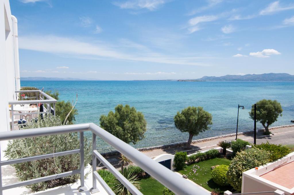 a view of the ocean from a balcony at Nautilus Nontas Hotel in Megalochori