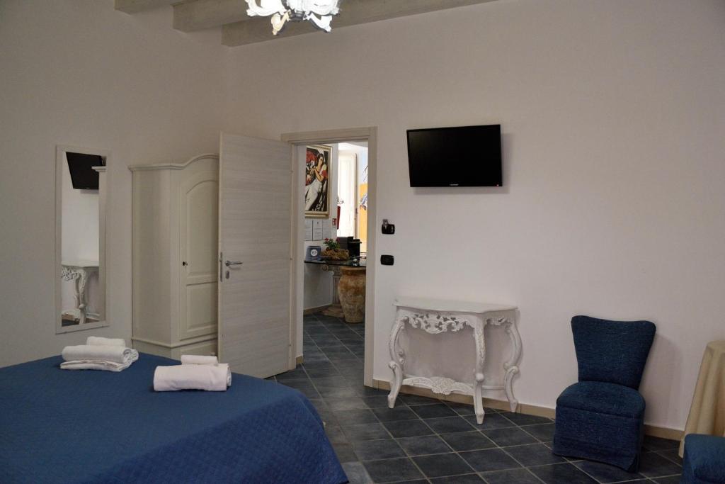 Postel nebo postele na pokoji v ubytování B&B Dimora di Girgenti