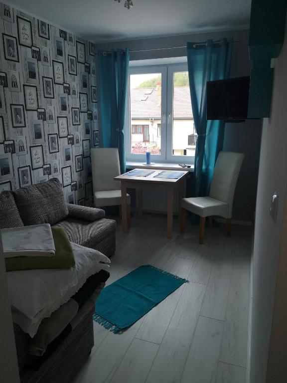 Posedenie v ubytovaní Apartamenty Hejszowina