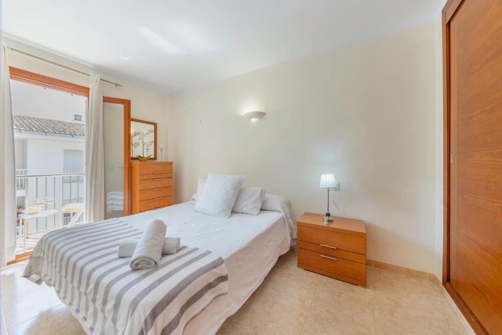 Postel nebo postele na pokoji v ubytování Can Jaume Apartment