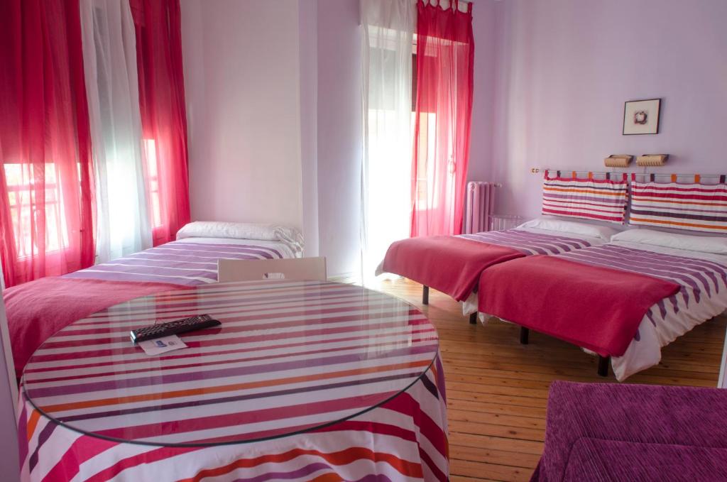 Cama o camas de una habitación en Pensión Blanca B&B