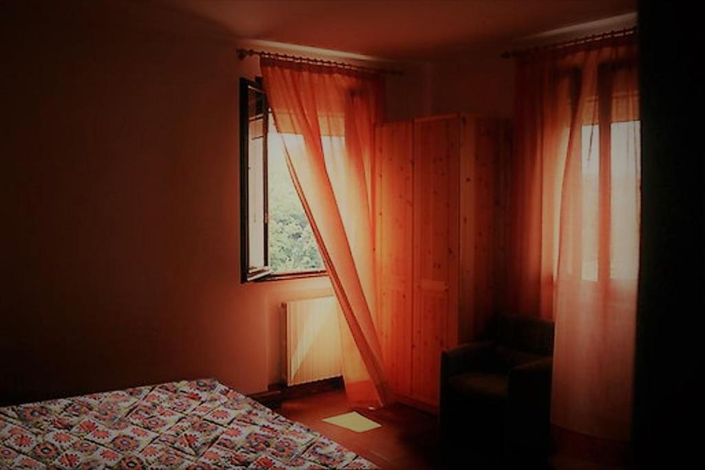 Postel nebo postele na pokoji v ubytování Agriturismo Ai Gradoni
