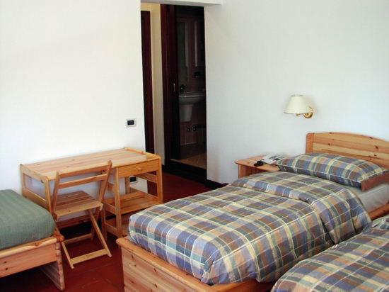 Postel nebo postele na pokoji v ubytování Agriturismo Ai Gradoni