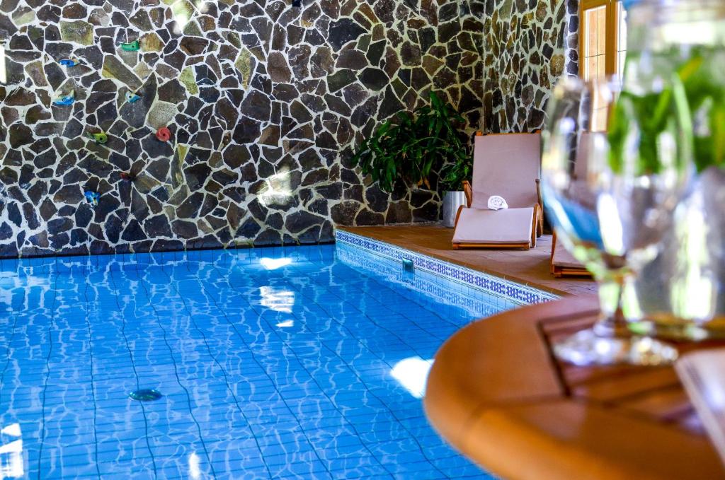 Bazén v ubytování Hotel****Liptovský dvor nebo v jeho okolí