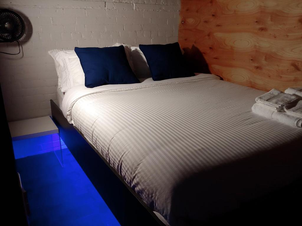 Postel nebo postele na pokoji v ubytování Zens Inn