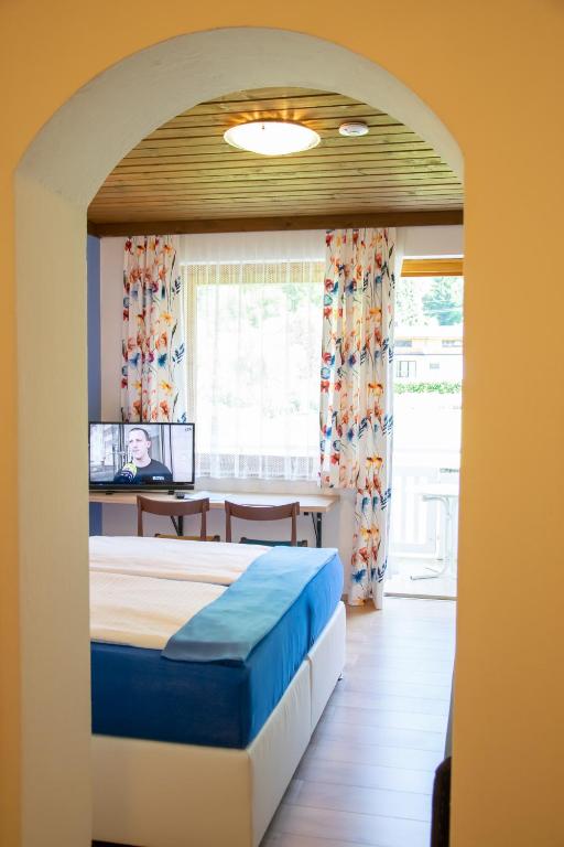 Postel nebo postele na pokoji v ubytování Klamberghof Burgstaller