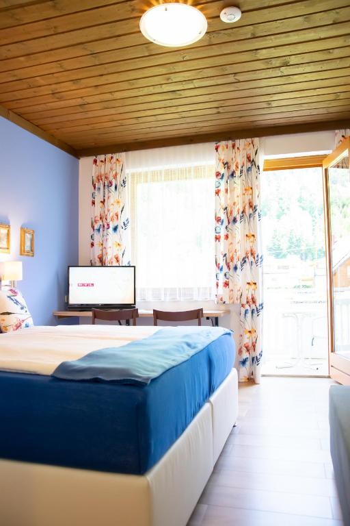 Postel nebo postele na pokoji v ubytování Klamberghof Burgstaller