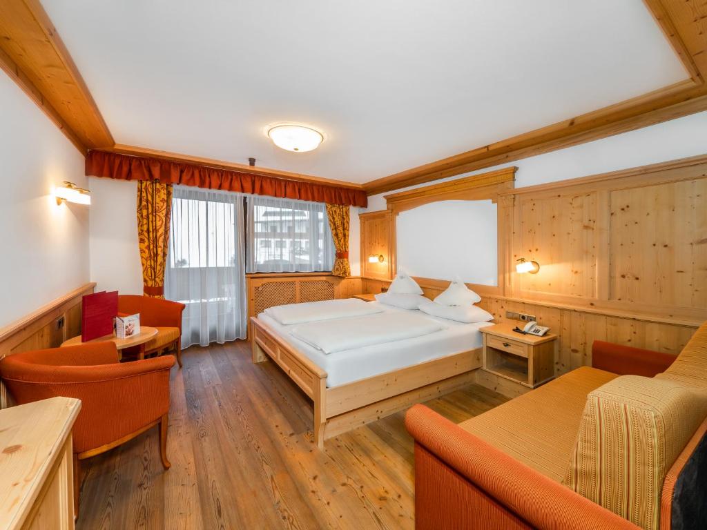 Postel nebo postele na pokoji v ubytování Hotel Alaska