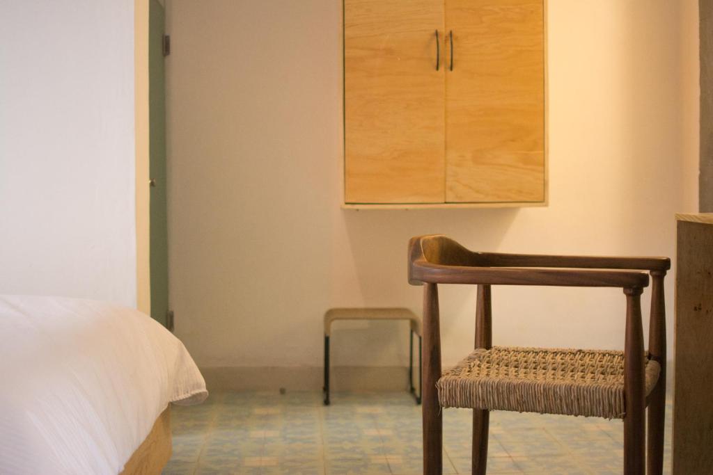 Postel nebo postele na pokoji v ubytování Hotel Casona Independencia
