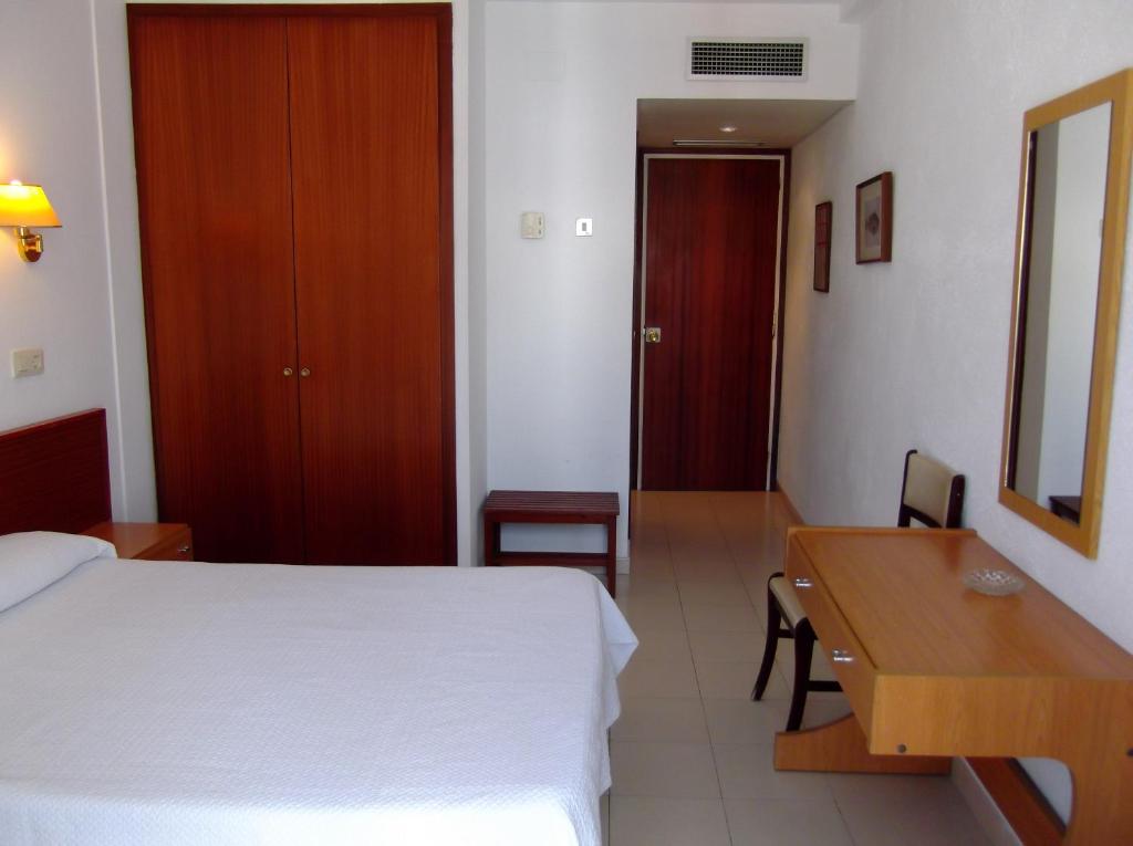 Postel nebo postele na pokoji v ubytování Hotel Simeon