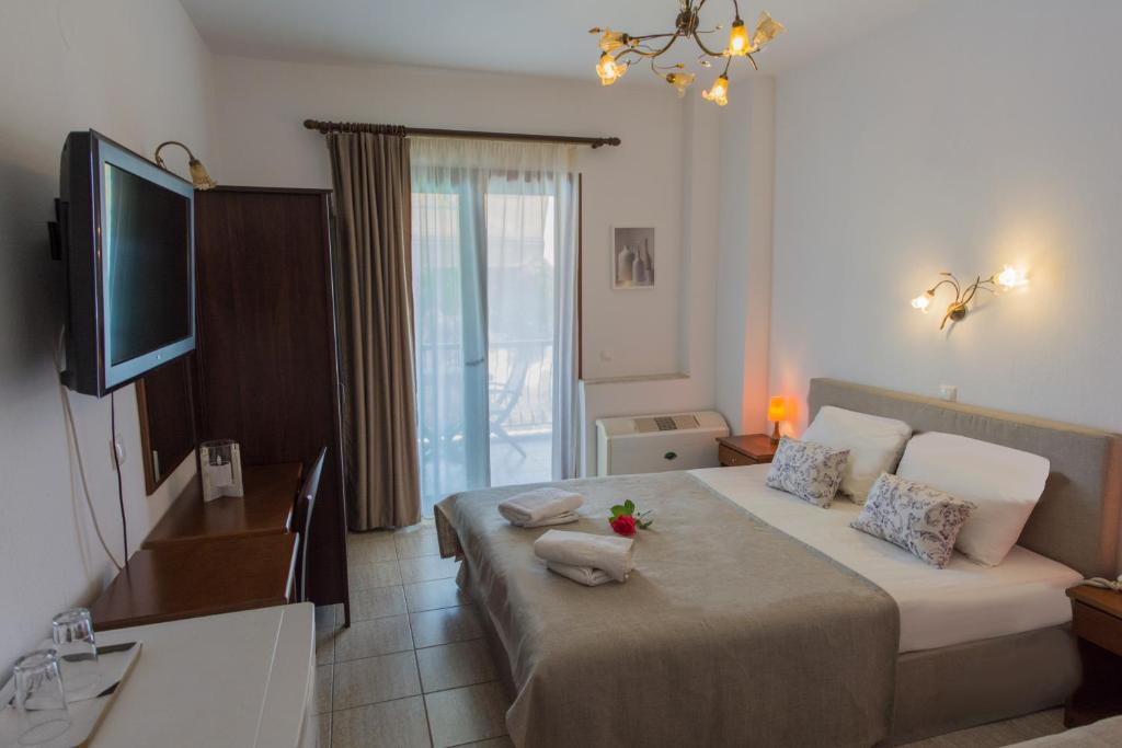 Postel nebo postele na pokoji v ubytování HOTEL BARA