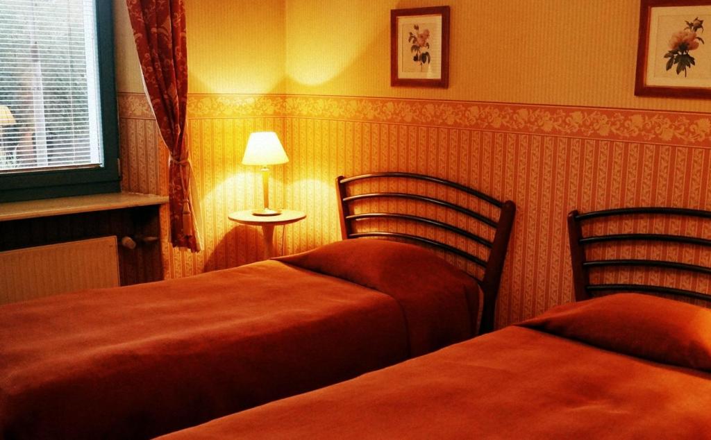 Posteľ alebo postele v izbe v ubytovaní Hotel Marmułowski